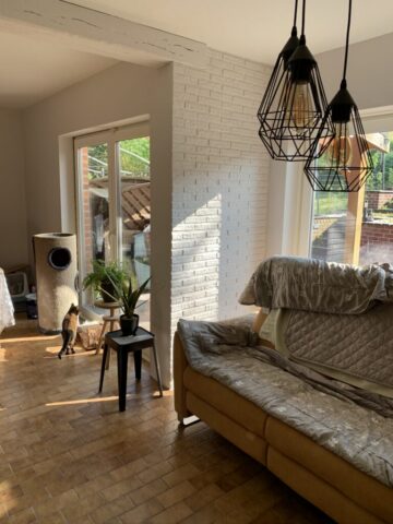 Salon rénové meilleur circulation fluide agencement nouveau canapé